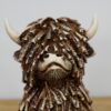 DF-DUT-11275-featured Sitting Highland Cow
